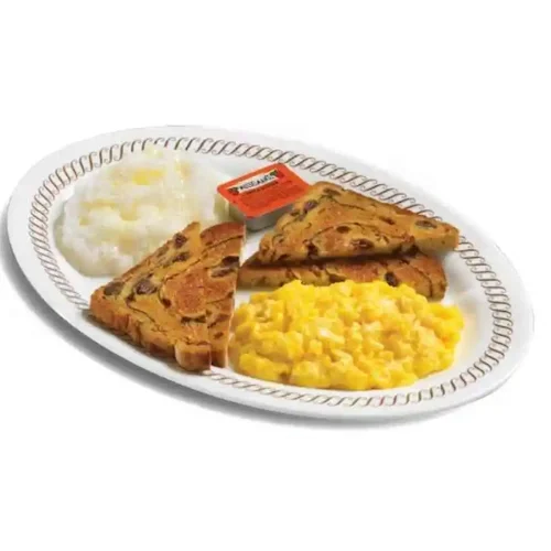 Waffle House cheese eggs served with raisin toast and grits on a classic diner plate